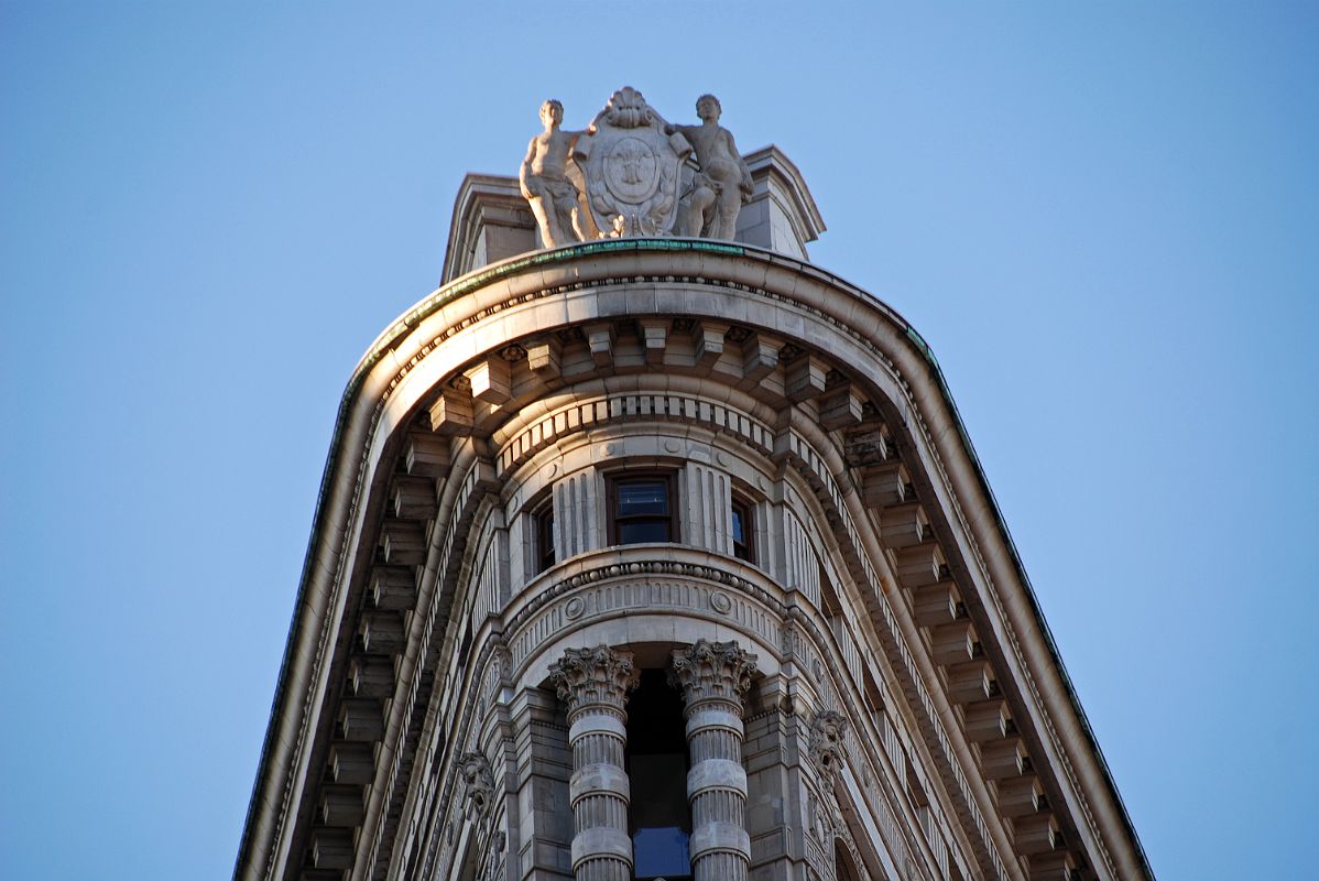 02-06 Greek Statues On The Roof Apex Of The Flatiron Building In New York Madison Square Park